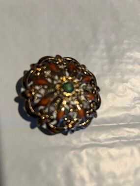 Vintage Monet ,Gold-Tone Floral Filigree Brooch with Orange and Green Accents